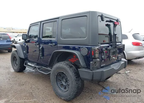 2013 Jeep Wrangler Unlimited Freedom Edition из США, поврежденный, VIN 1C4BJWDG4DL586397